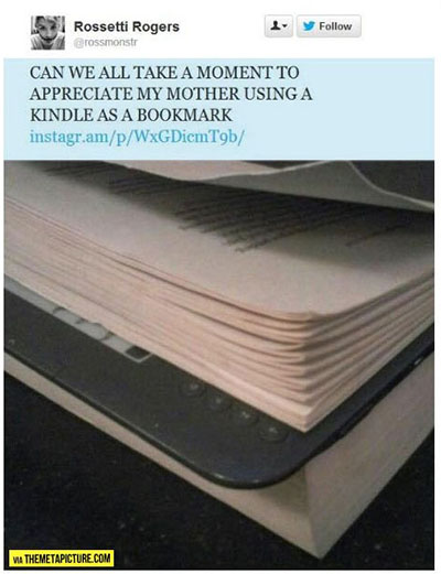 Twitter user Rossetti Rogers shares a picture of her mom using a Kindle as a bookmark in a physical book.